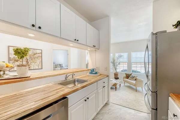 $305,000 | 4760 South Wadsworth Boulevard, Unit J107, Littleton, CO 80123