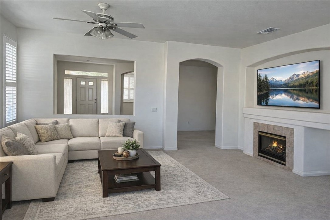 1961 Riviera Avenue Banning, CA 92220 - Photo 11 of 60 a living room with furniture and a fireplace