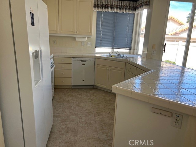 1961 Riviera Avenue Banning, CA 92220 - Photo 12 of 60 a view of a kitchen with a sink