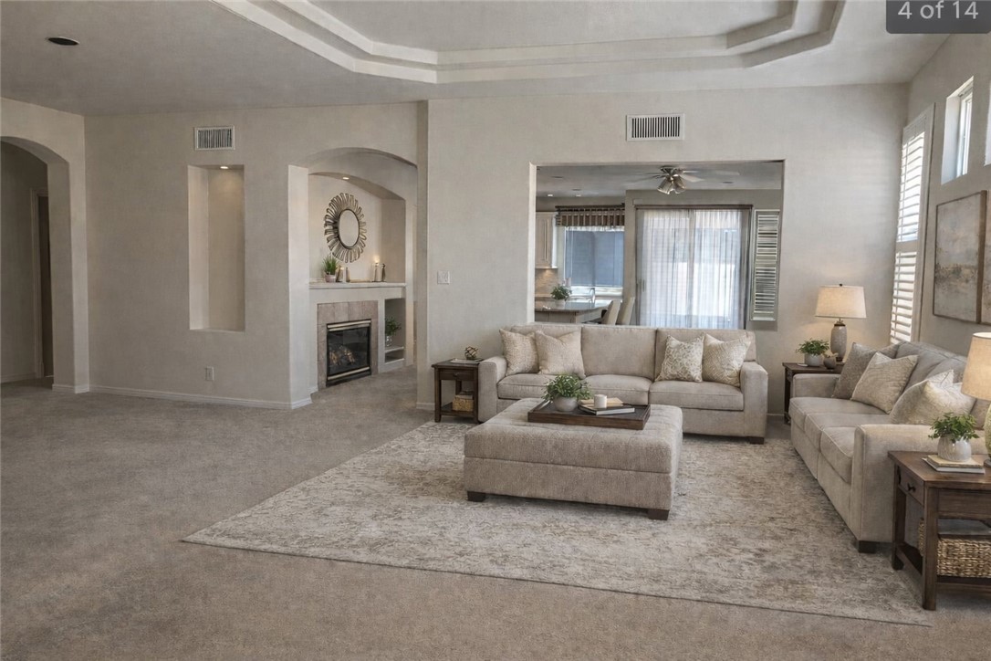 1961 Riviera Avenue Banning, CA 92220 - Photo 14 of 60 a living room with furniture and a fireplace