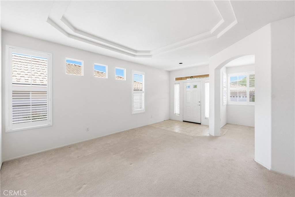 1961 Riviera Avenue Banning, CA 92220 - Photo 17 of 60 an empty room with windows