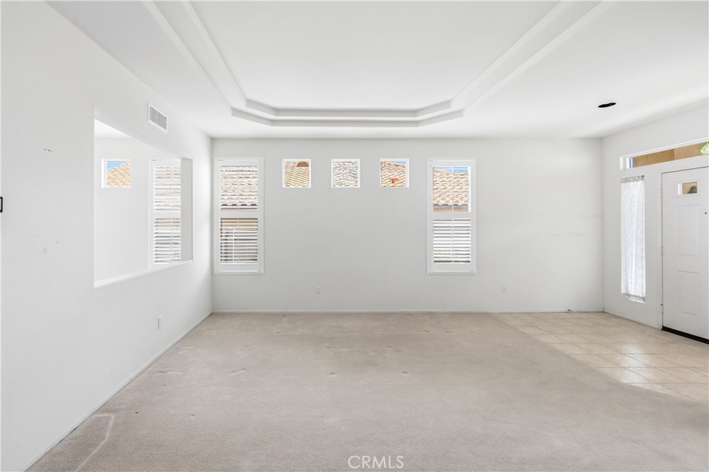 1961 Riviera Avenue Banning, CA 92220 - Photo 18 of 60 an empty room with windows