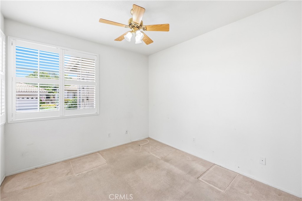 1961 Riviera Avenue Banning, CA 92220 - Photo 20 of 60 an empty room with a window