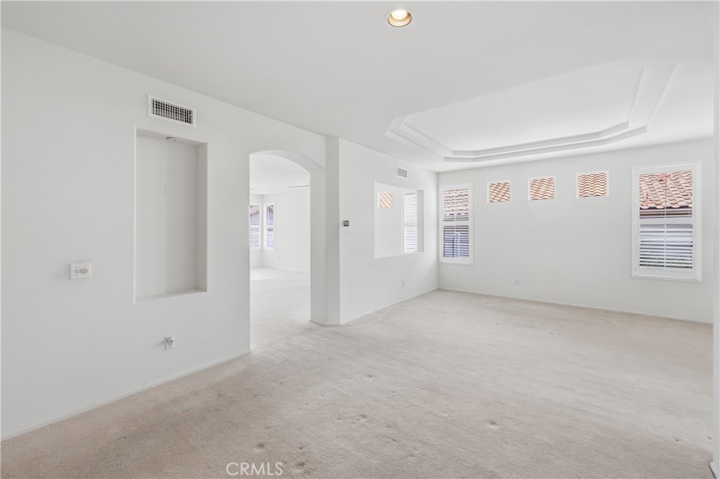 1961 Riviera Avenue Banning, CA 92220 - Photo 24 of 60 an empty room with windows