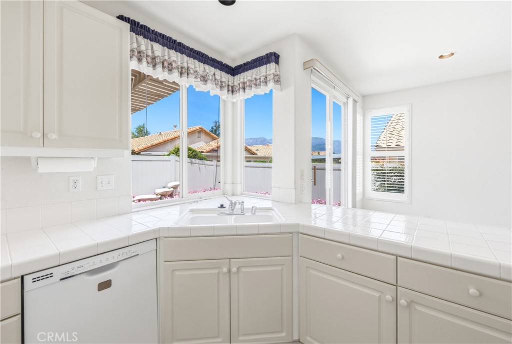 1961 Riviera Avenue Banning, CA 92220 - Photo 37 of 60 a kitchen with a sink cabinets and window