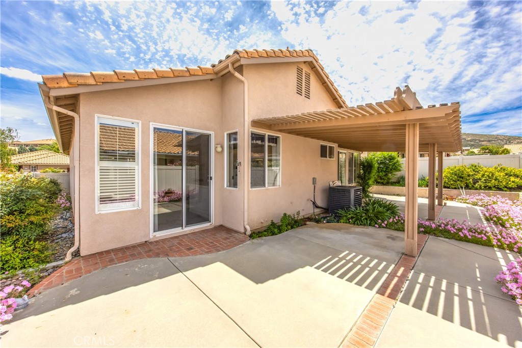 1961 Riviera Avenue Banning, CA 92220 - Photo 51 of 60 a front view of a house with a garden