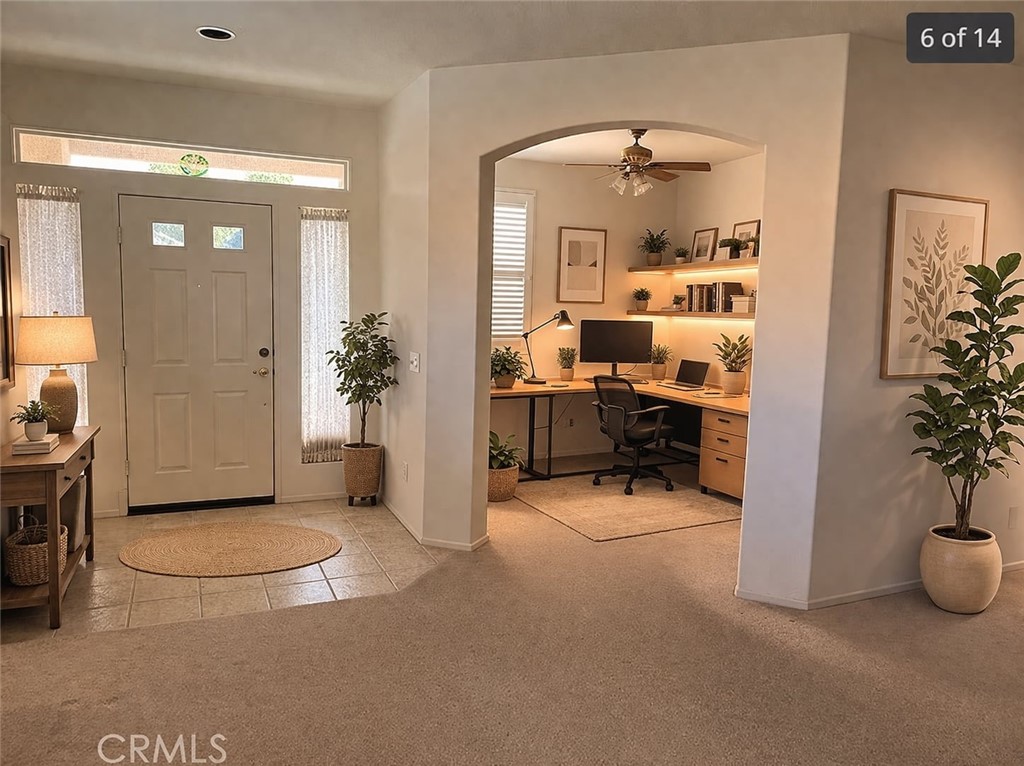 1961 Riviera Avenue Banning, CA 92220 - Photo 8 of 60 a view of a livingroom with entryway and dining area