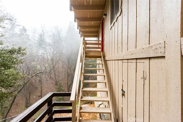 a view of a balcony with stairs