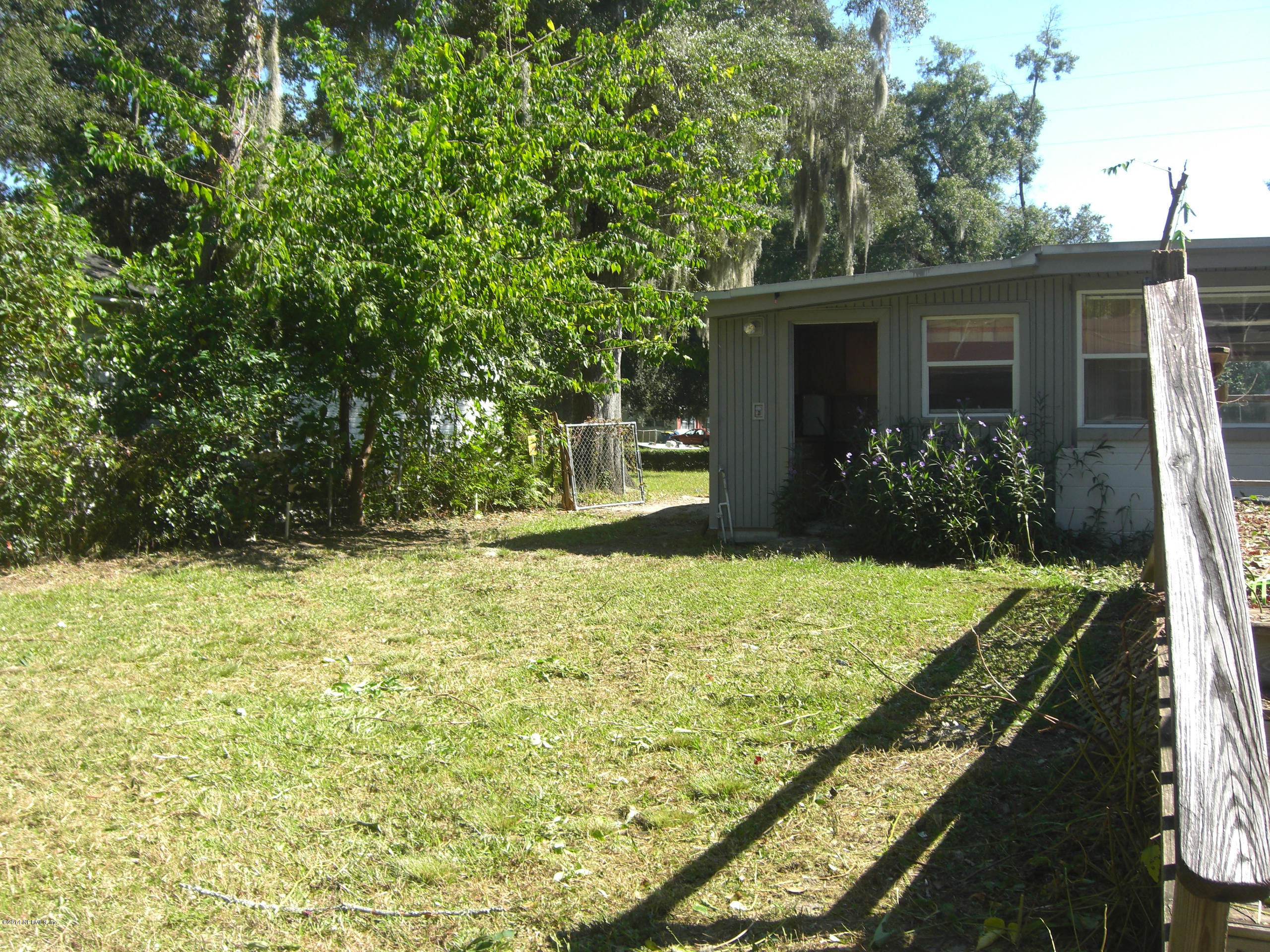10586 Rutgers Road Jacksonville, FL 32218 - Photo 6 of 50 a house view with a garden space