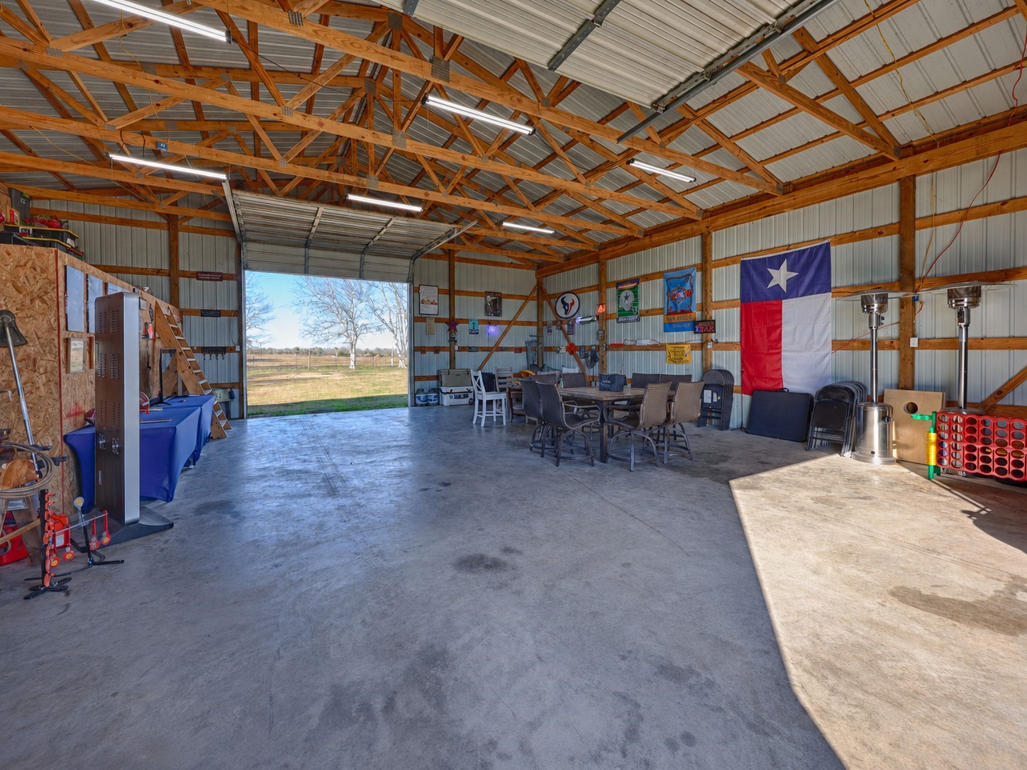 1055 County Road Weimar, TX 78962 - Photo 22 of 33 Additional interior view highlighting the barn’s open layout and versatility.