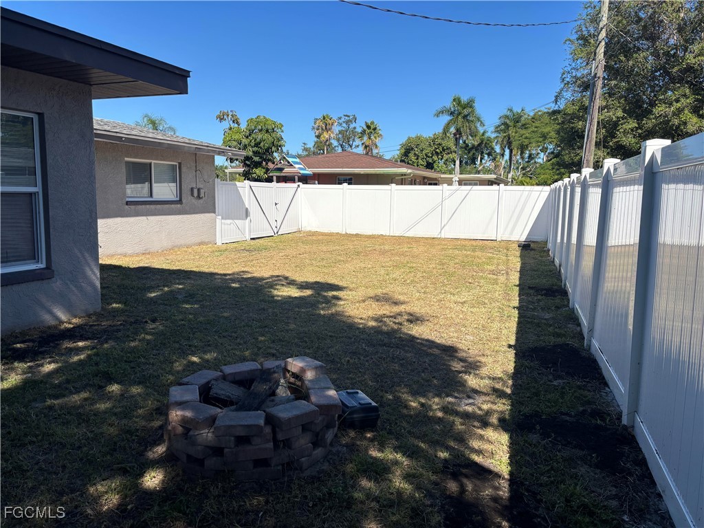 5521 Granada Road Fort Myers, FL 33919 - Photo 16 of 17 a view of a swimming pool with an outdoor space
