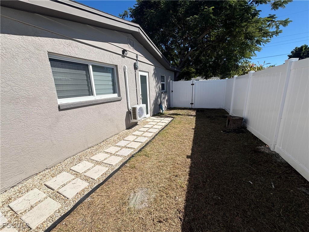 5521 Granada Road Fort Myers, FL 33919 - Photo 17 of 17 a view of a house with a yard