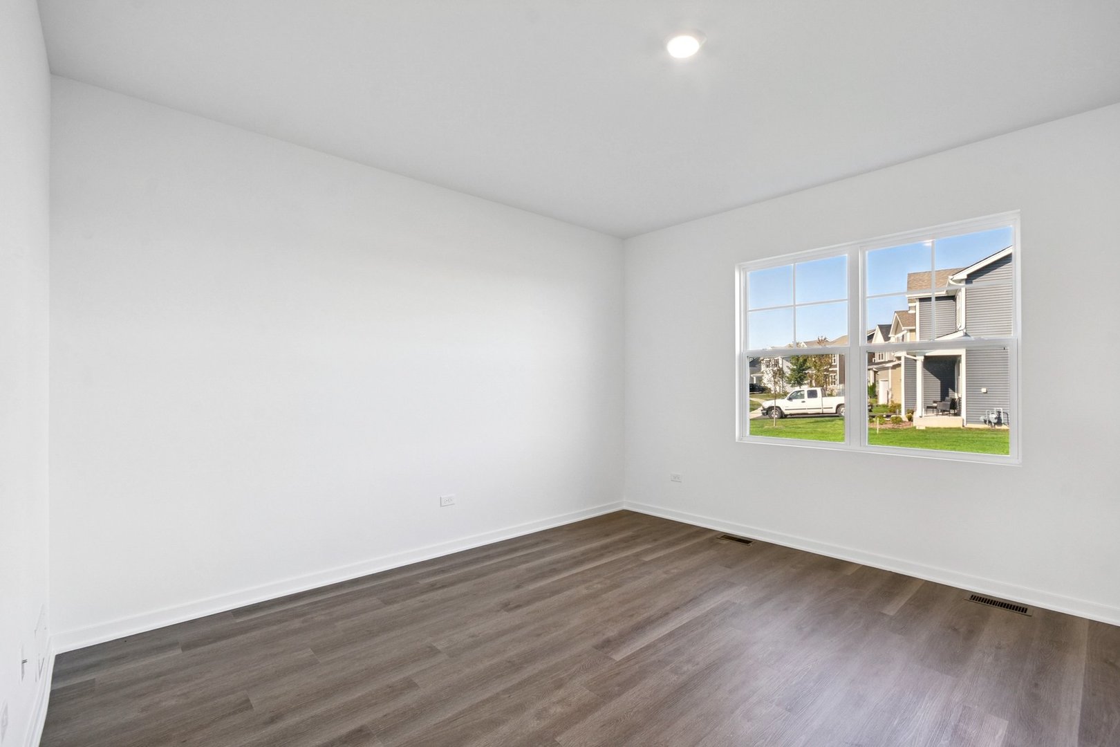 13712 Palmetto Drive Plainfield, IL 60544 - Photo 25 of 50 a view of kitchen and wooden floor