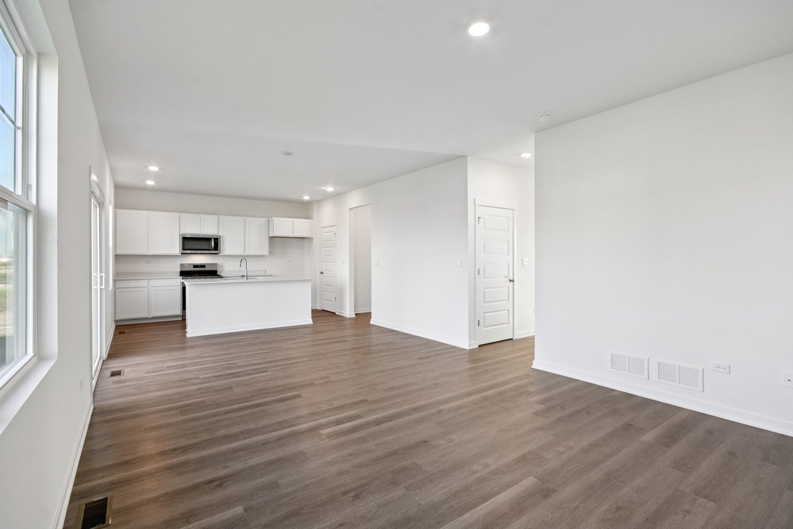 13712 Palmetto Drive Plainfield, IL 60544 - Photo 26 of 50 a view of kitchen with wooden floor