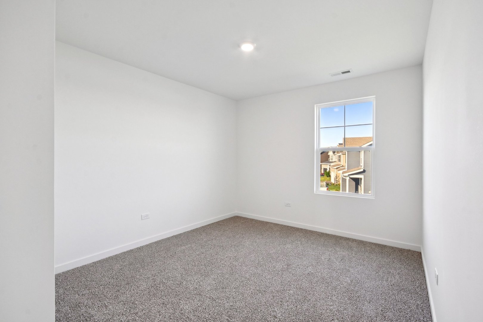 13712 Palmetto Drive Plainfield, IL 60544 - Photo 46 of 50 an empty room with a window