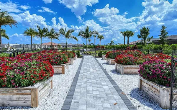 a view of a swimming pool with a table and chairs