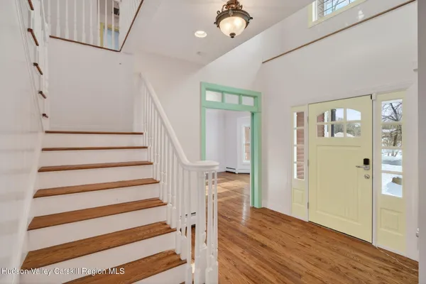 a kitchen with stainless steel appliances kitchen island granite countertop a sink and cabinets