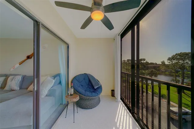 a en suite bathroom with a granite countertop sink and a mirror