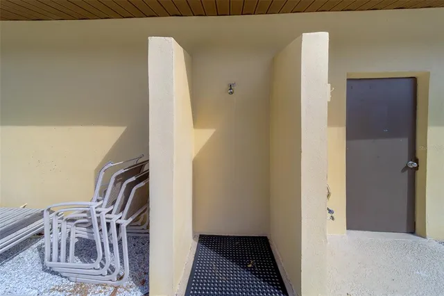 a view of a swimming pool with a yard