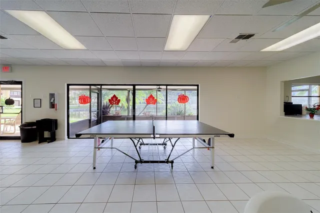 an aerial view of house with a yard