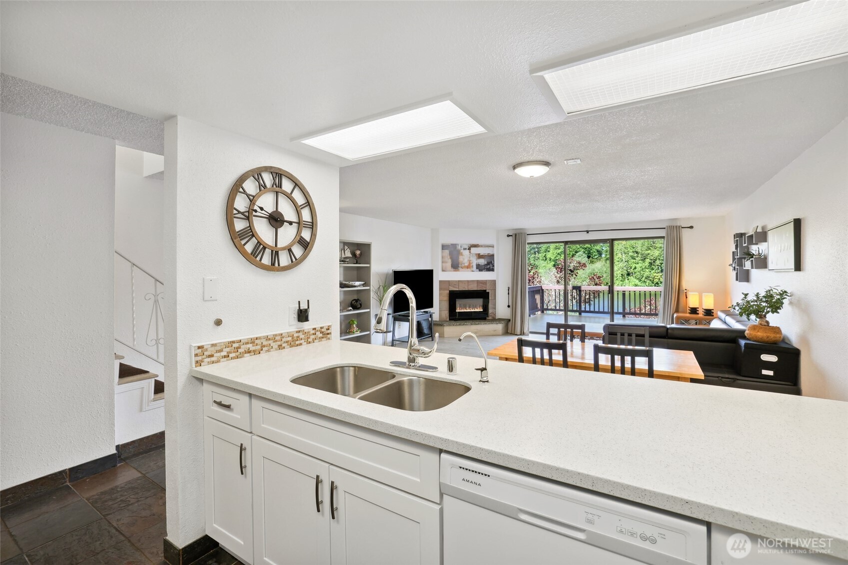 30831 13th Place South, Unit 13 Federal Way, WA 98003 - Photo 12 of 38 a view of a kitchen with a sink and a refrigerator