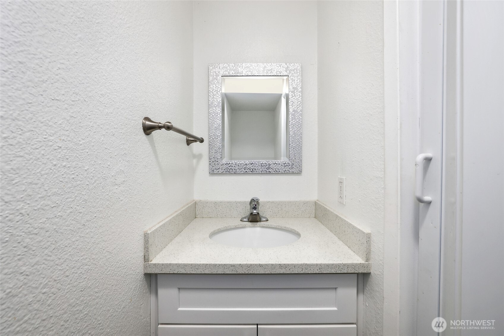 30831 13th Place South, Unit 13 Federal Way, WA 98003 - Photo 16 of 38 a bathroom with a sink and a mirror