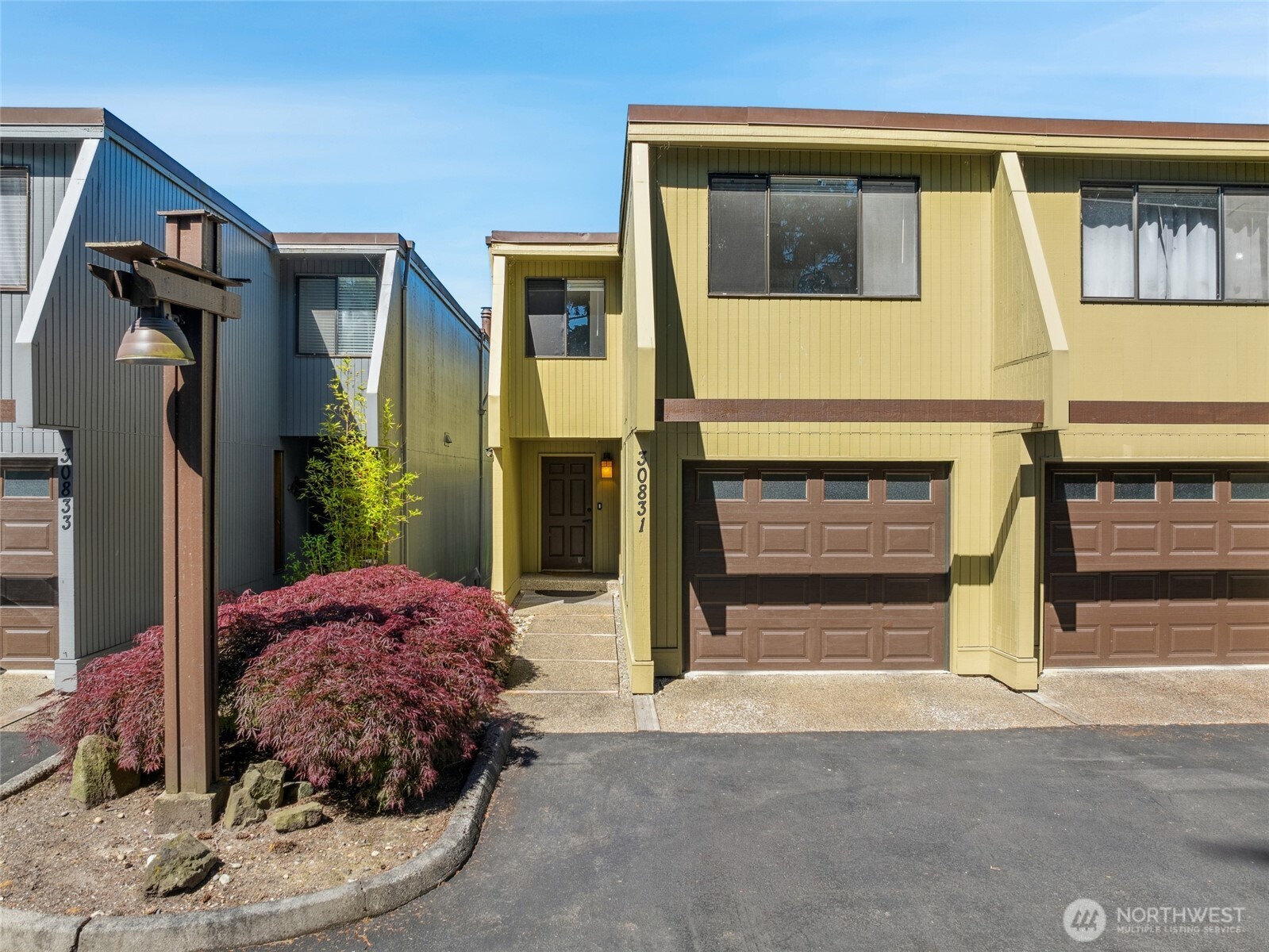 30831 13th Place South, Unit 13 Federal Way, WA 98003 - Photo 2 of 38 a living room with a fireplace and a walk in closet