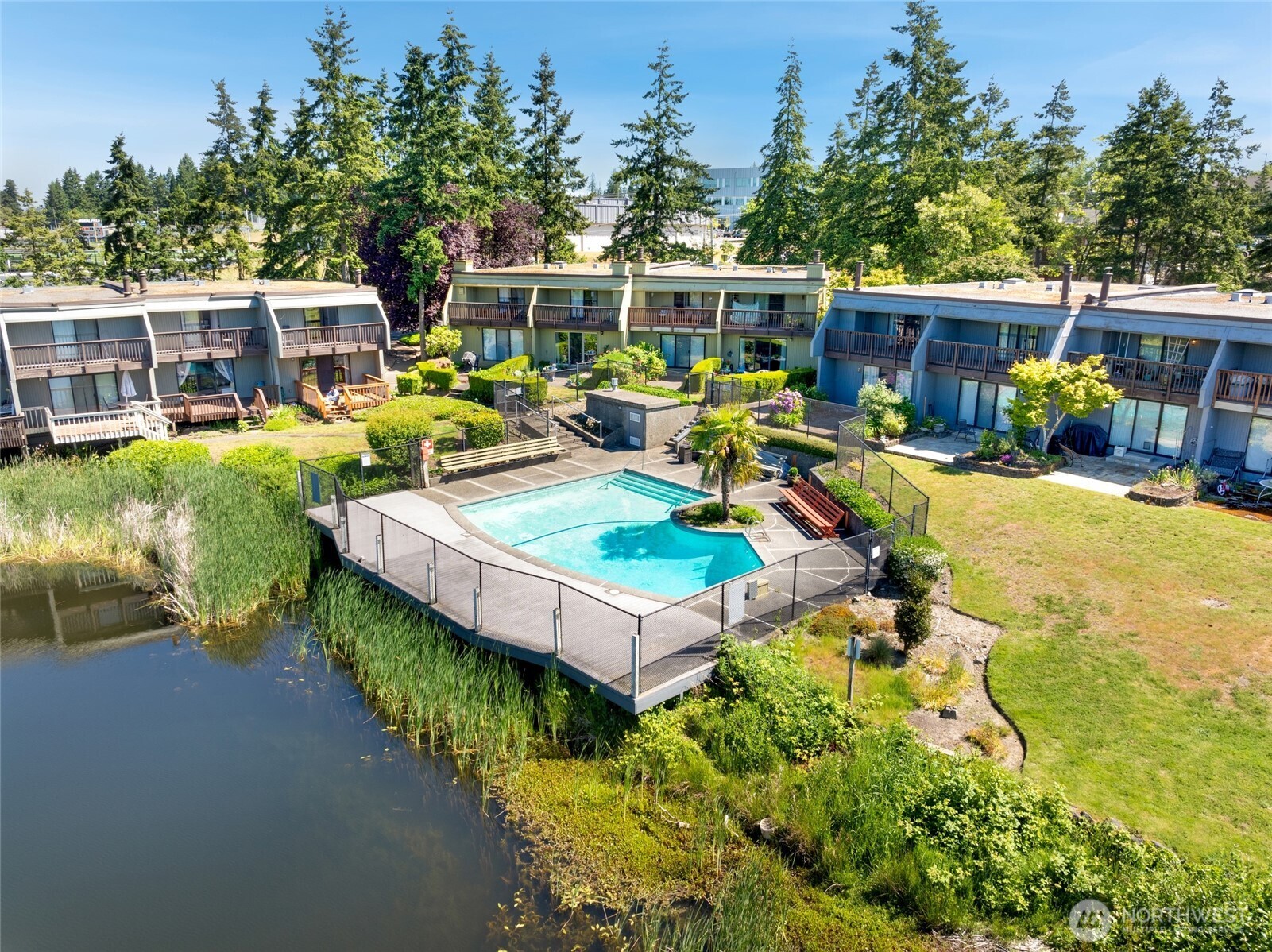 30831 13th Place South, Unit 13 Federal Way, WA 98003 - Photo 34 of 38 an aerial view of a house with swimming pool garden and patio
