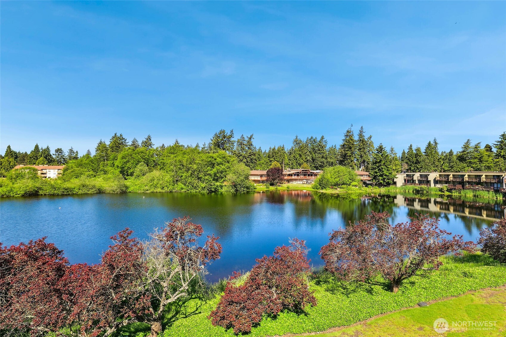 30831 13th Place South, Unit 13 Federal Way, WA 98003 - Photo 37 of 38 an aerial view of a houses with a lake view