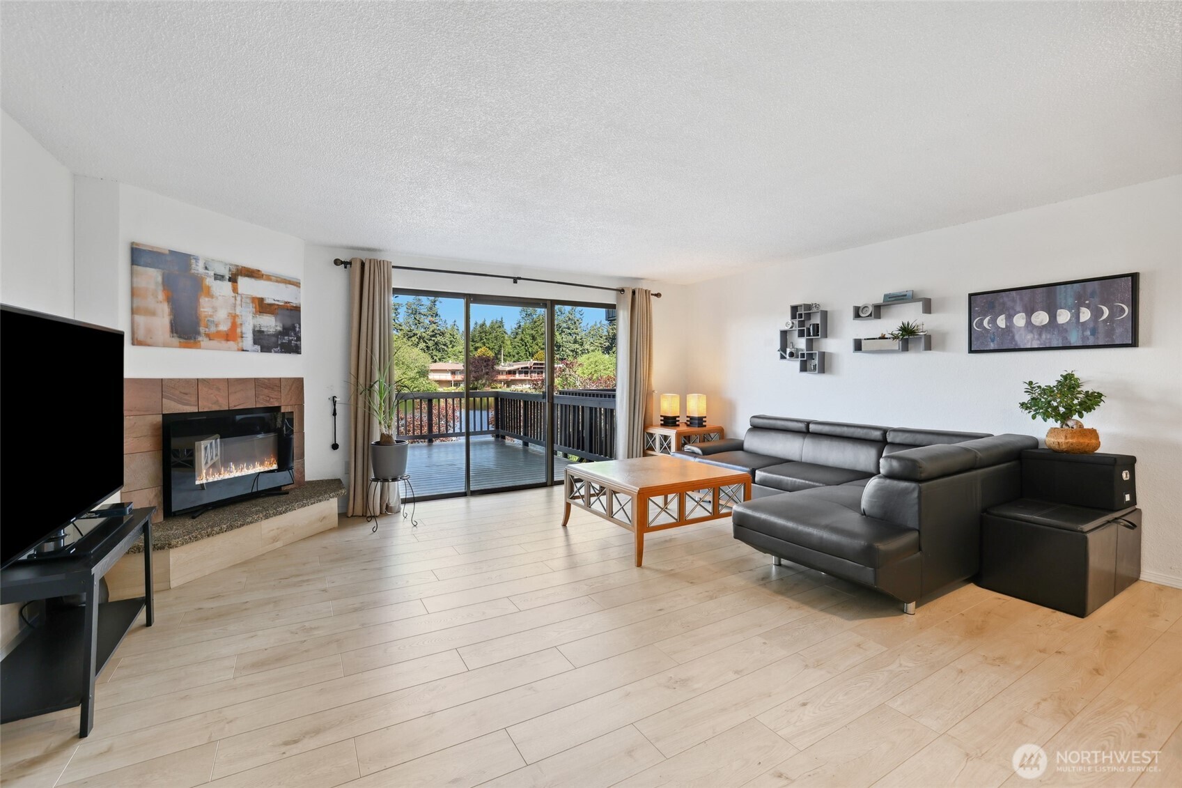 30831 13th Place South, Unit 13 Federal Way, WA 98003 - Photo 7 of 38 a living room with furniture and a fireplace