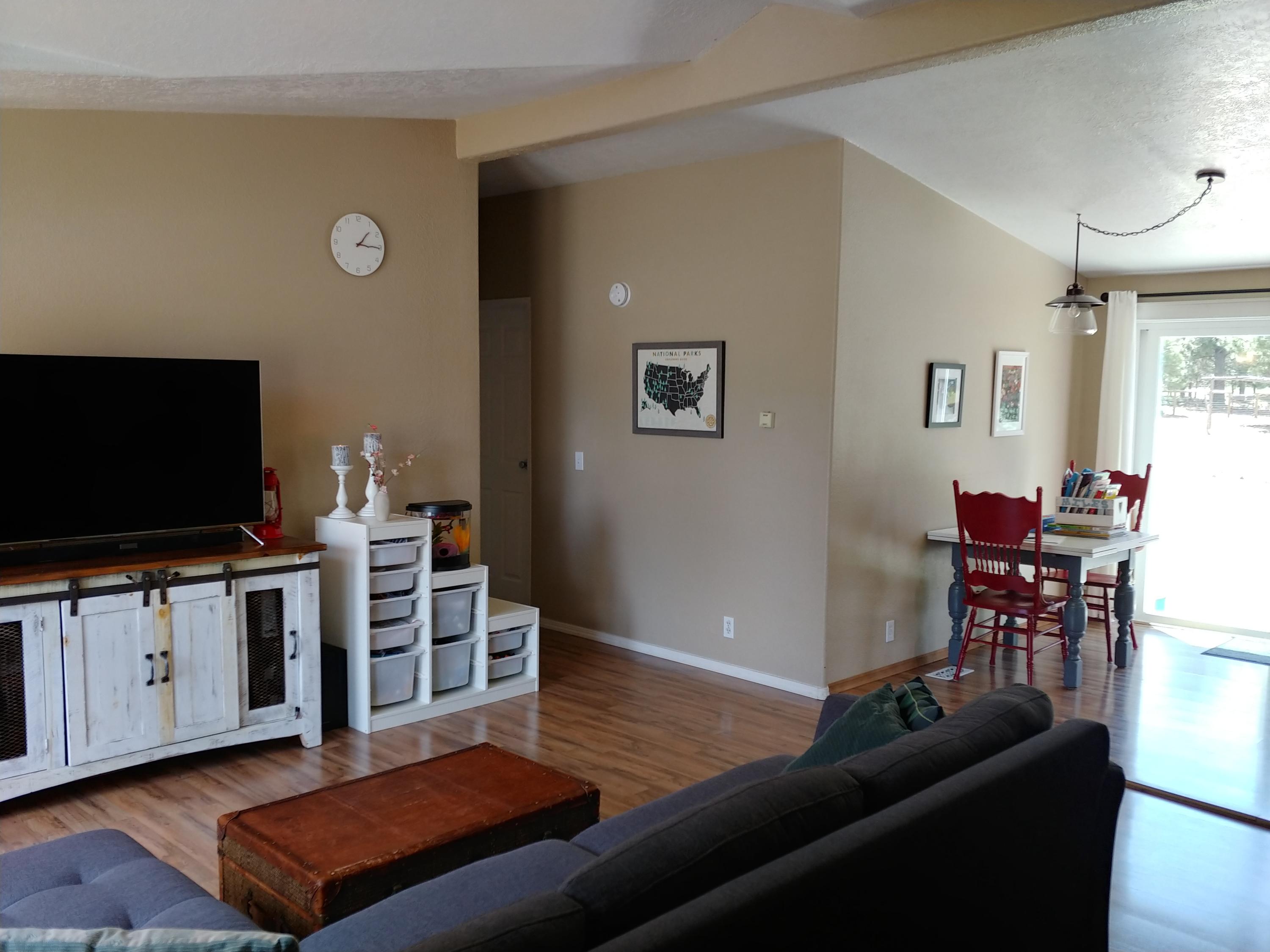 19135 Rustic Canyon Road Bend, OR 97702 - Photo 2 of 30 Living, dining room w/ vaulted ceilings