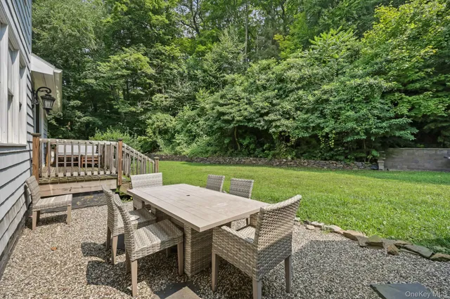 a view of a table and chairs in the patio