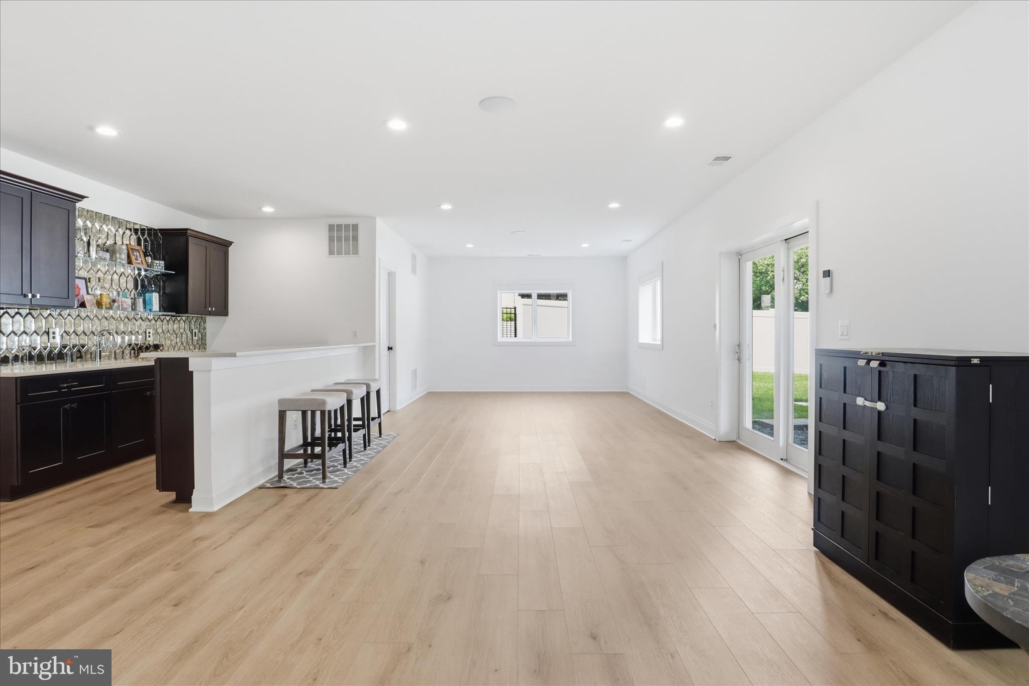 202 Branch Road Southeast Vienna, VA 22180 - Photo 47 of 59 a view of a kitchen with furniture and wooden floor