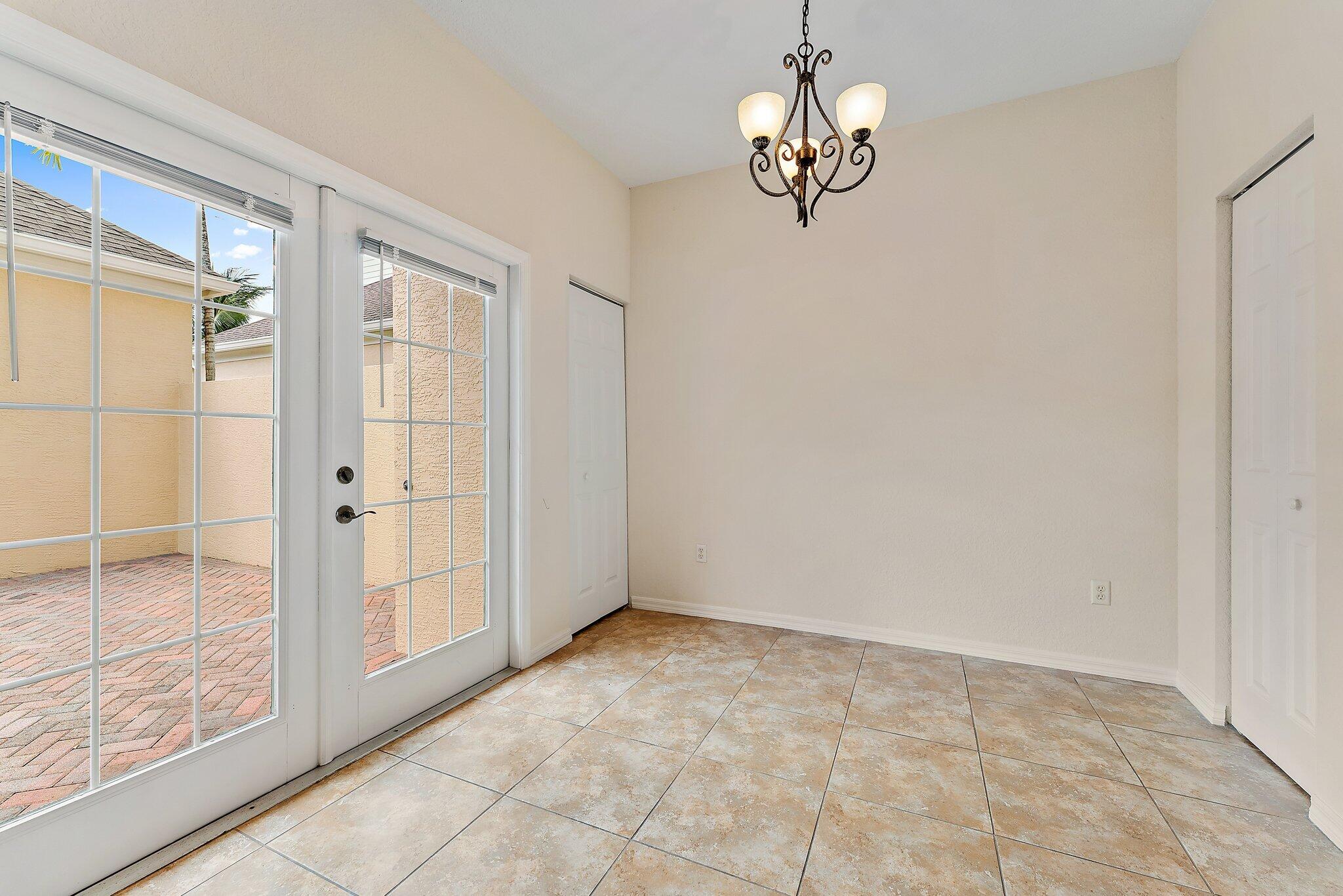 128 West Thatch Palm Circle Jupiter, FL 33458 - Photo 13 of 31 a view of an empty room with window