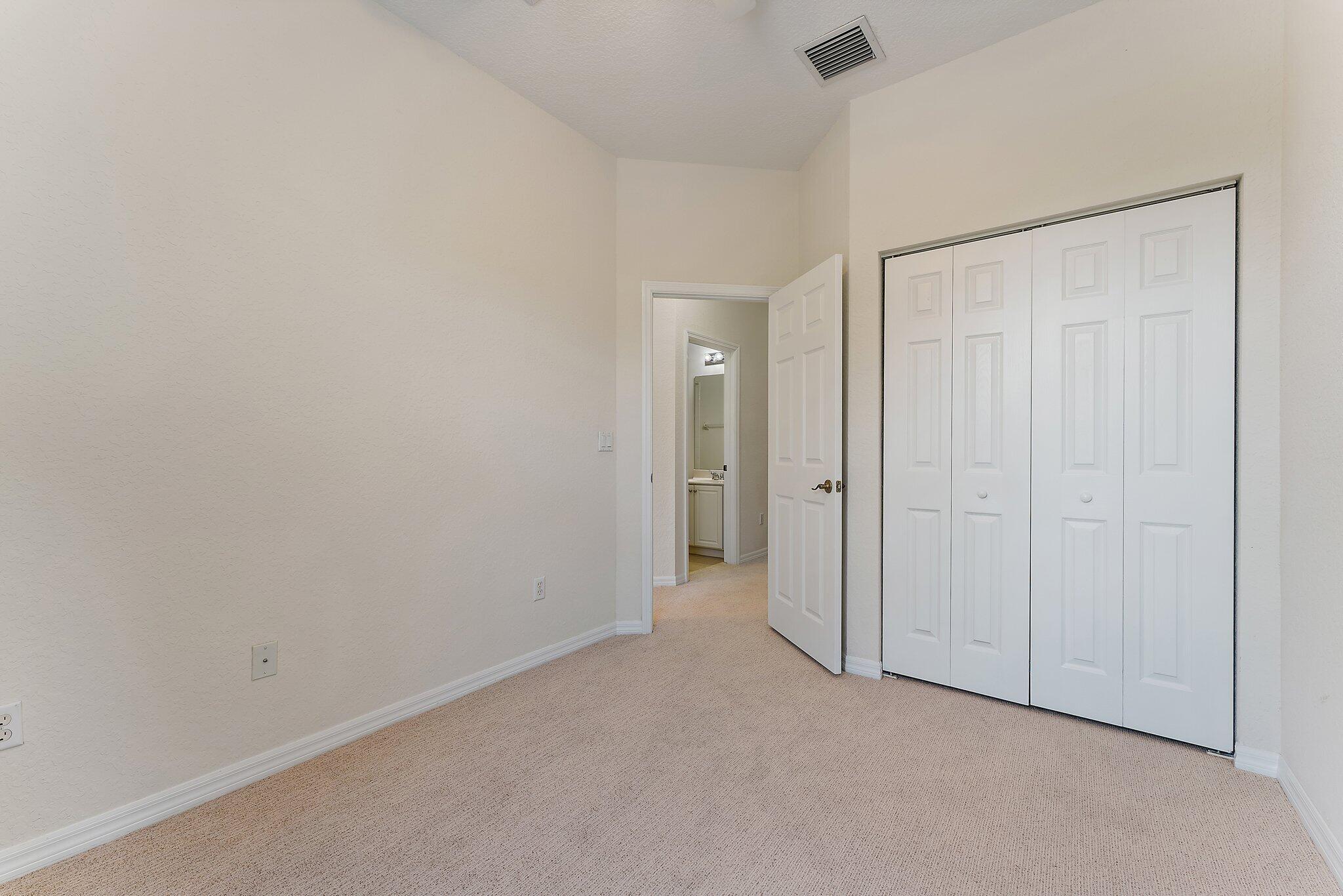 128 West Thatch Palm Circle Jupiter, FL 33458 - Photo 27 of 31 a view of an empty room