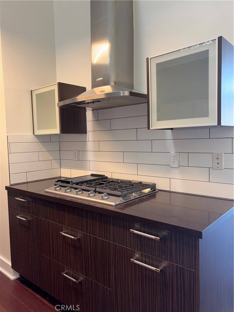 600 Ridgeley Drive Los Angeles, CA 90036 - Photo 6 of 29 a kitchen with a sink and a microwave