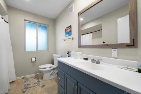 an aerial view of residential house with outdoor space