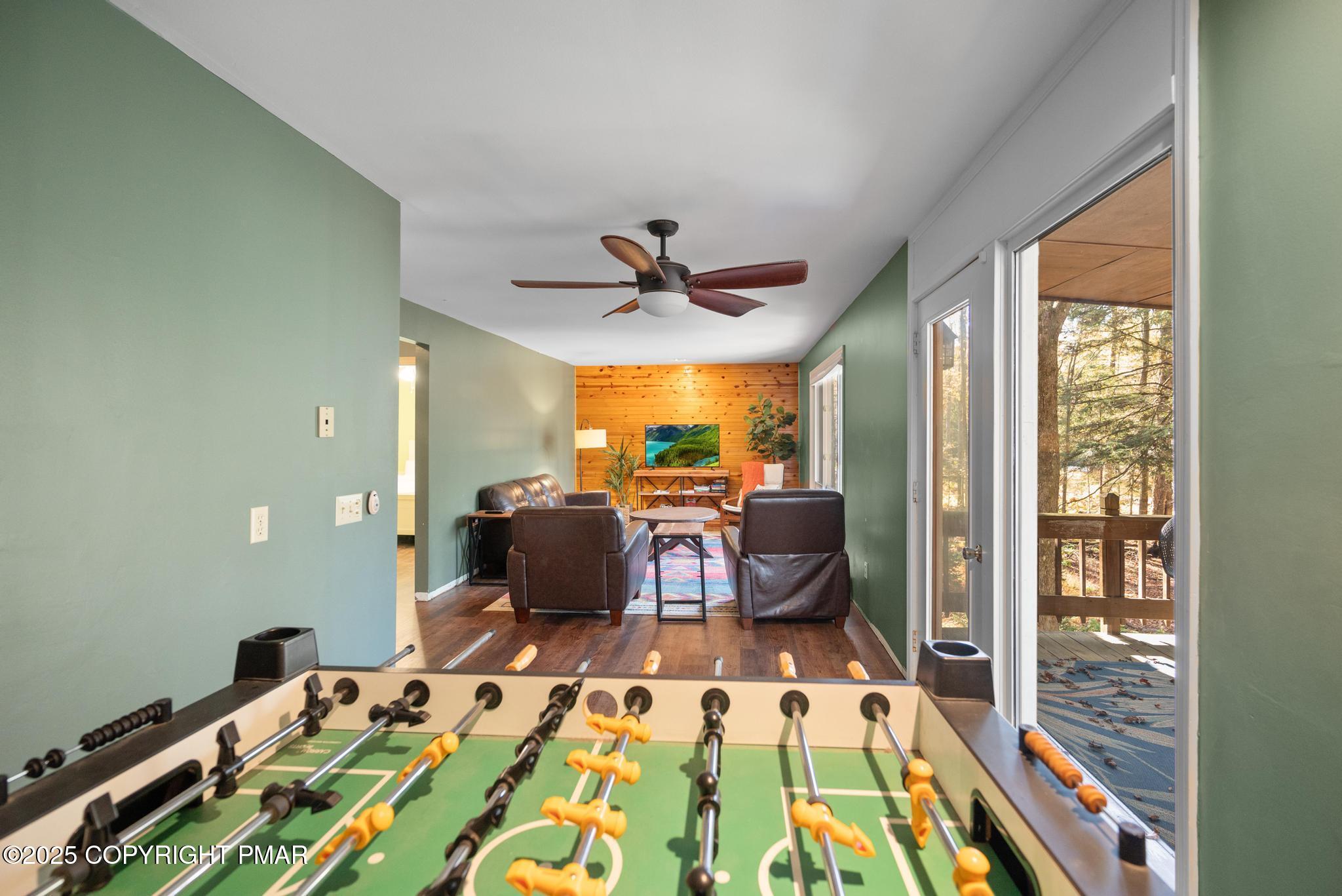 165 Sweet Briar Road Pocono Pines, PA 18350 - Photo 24 of 39 a bed room with a bed mirror and a window