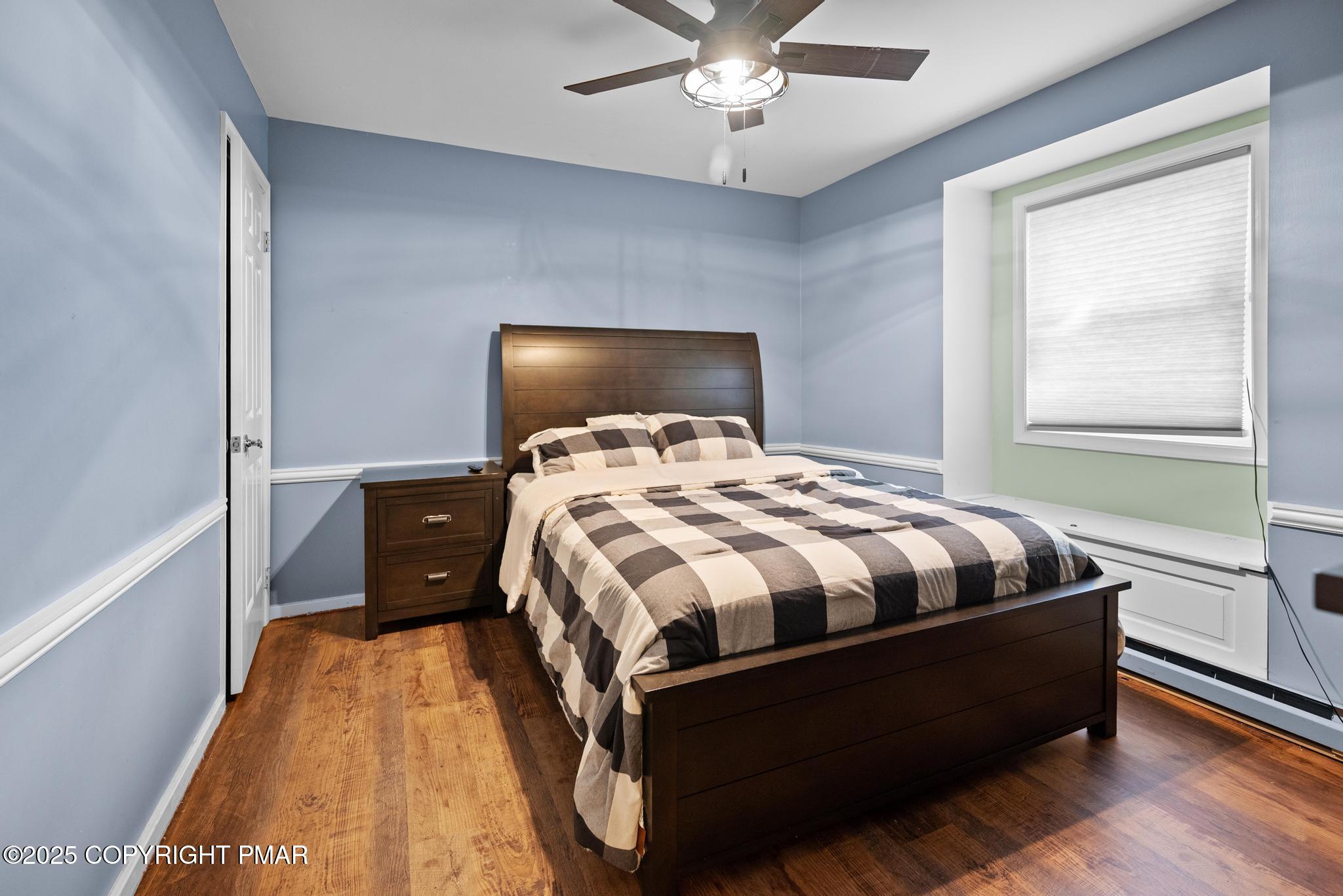 165 Sweet Briar Road Pocono Pines, PA 18350 - Photo 28 of 39 a bedroom with a bed and window