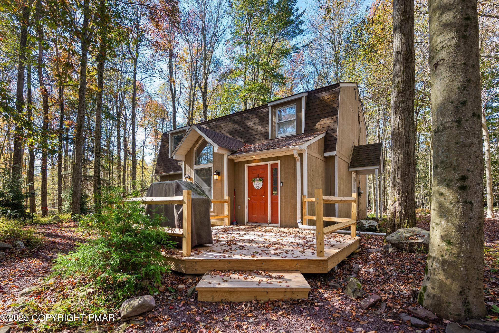 165 Sweet Briar Road Pocono Pines, PA 18350 - Photo 39 of 39 a front view of a house with garden