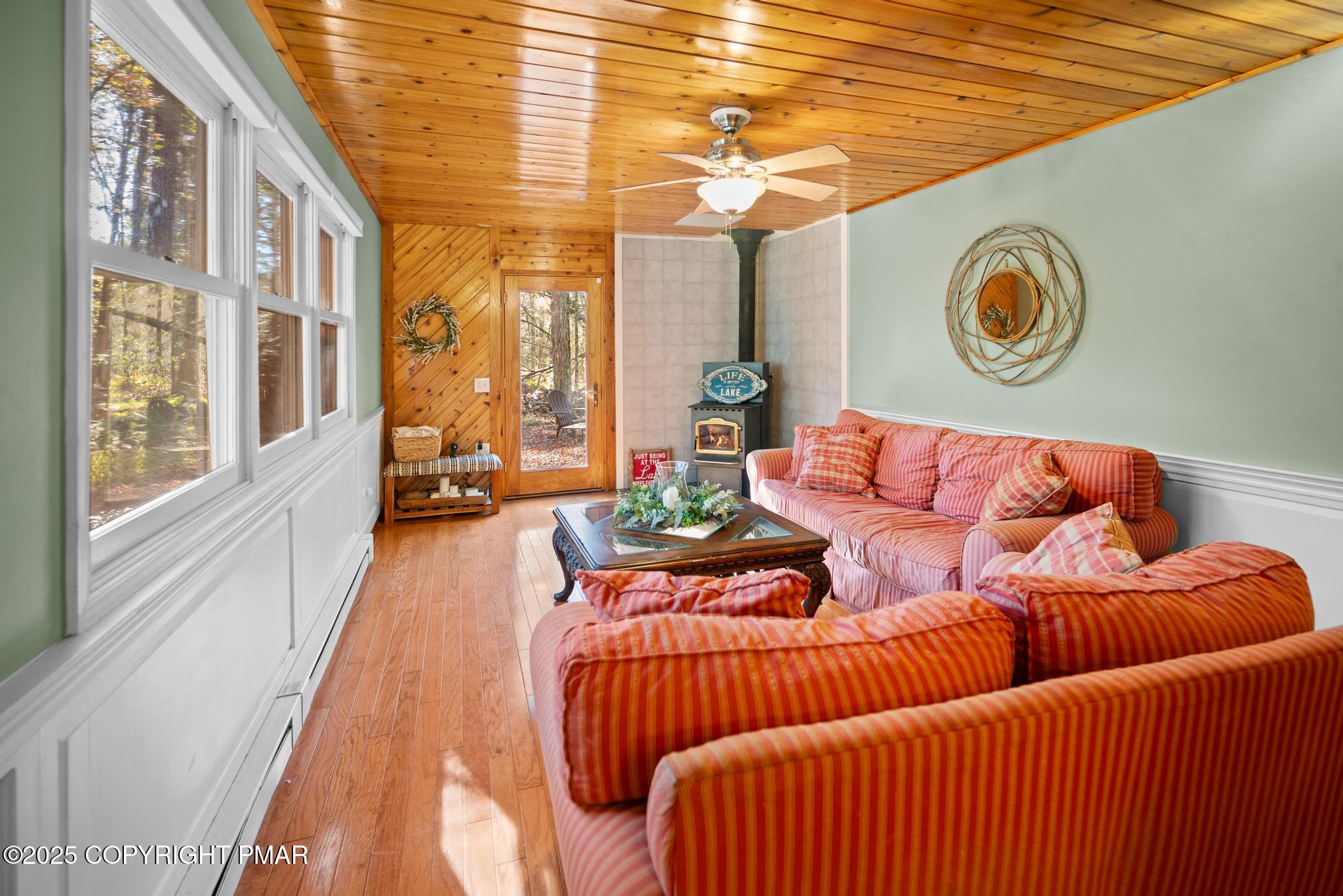 165 Sweet Briar Road Pocono Pines, PA 18350 - Photo 8 of 39 a living room with furniture and a window