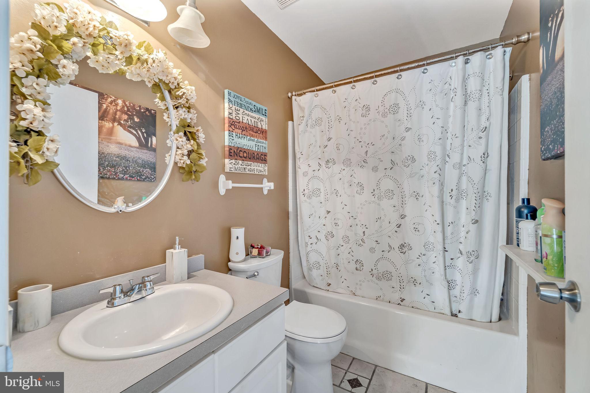 1 Granite Court Sicklerville, NJ 08081 - Photo 18 of 30 a bathroom with a sink and a mirror