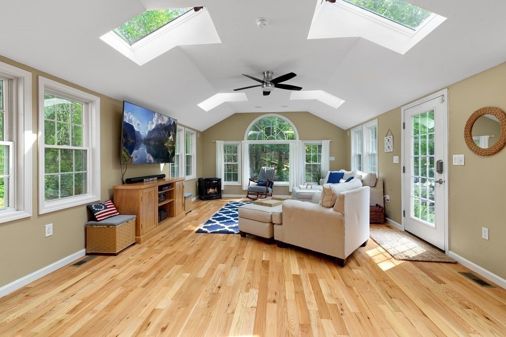 2 Cider Mill Road Framingham, MA 01701 - Photo 13 of 42 a living room with furniture and a large window
