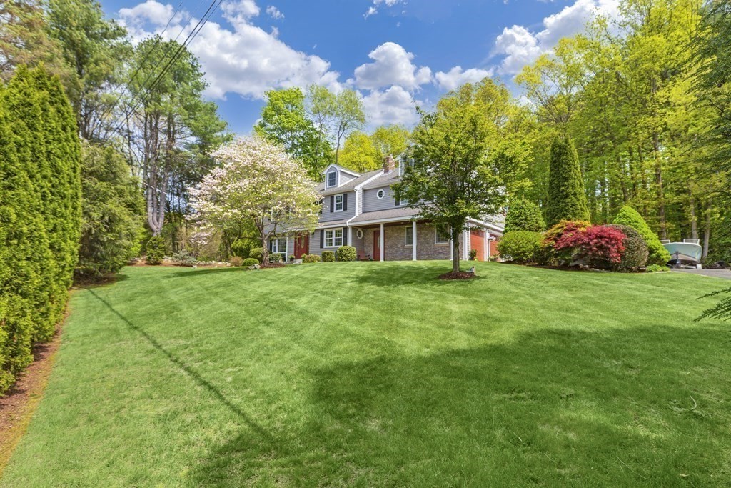 2 Cider Mill Road Framingham, MA 01701 - Photo 4 of 42 a front view of a house with garden