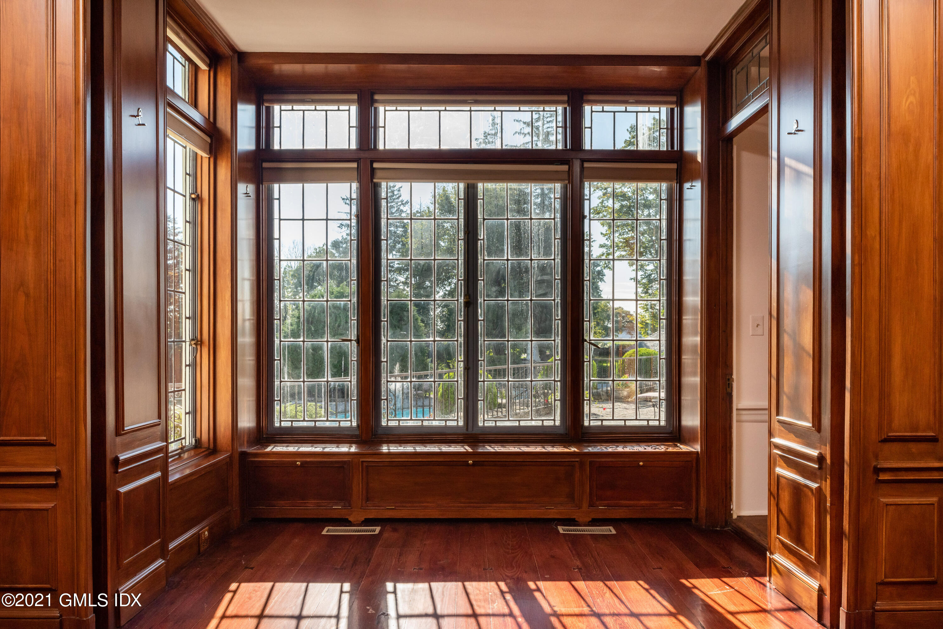 25 Doubling Road Greenwich, CT 06830 - Photo 13 of 30 a room with open window and a couch