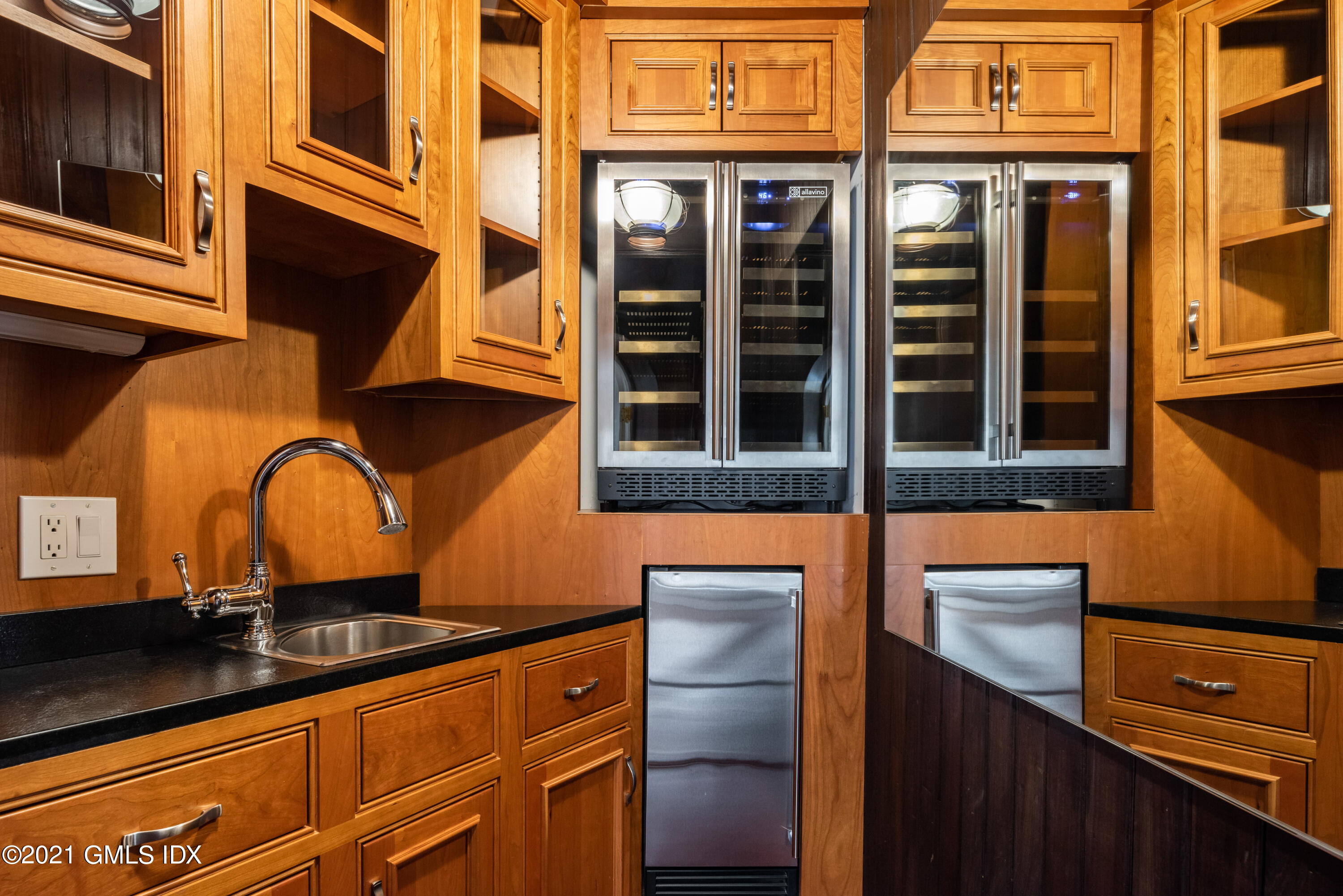 25 Doubling Road Greenwich, CT 06830 - Photo 14 of 30 a front view of a building with a lot of windows