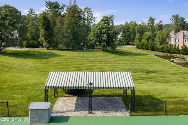 a view of swimming pool with a garden