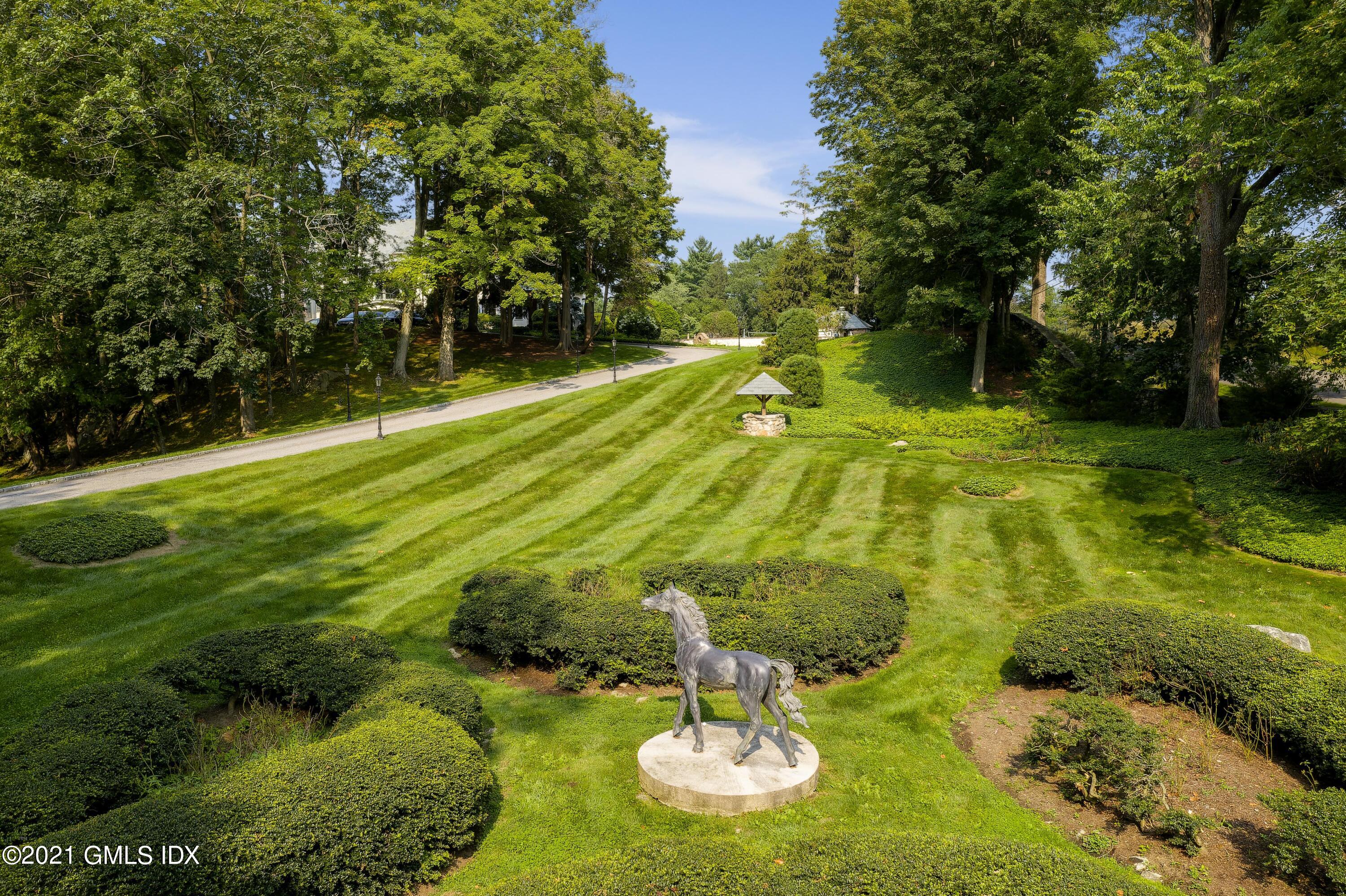 25 Doubling Road Greenwich, CT 06830 - Photo 26 of 30 a swimming pool with some trees
