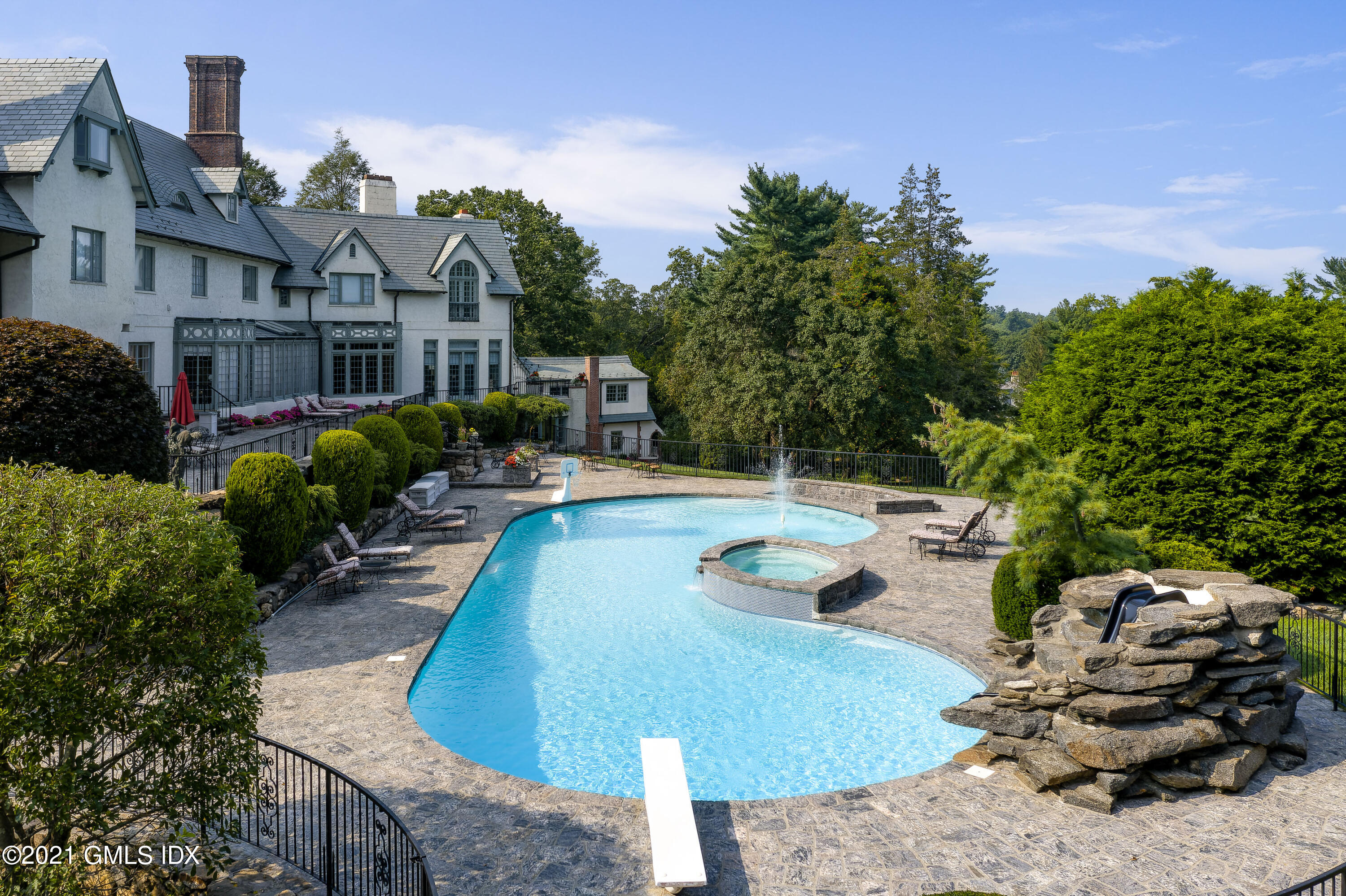 25 Doubling Road Greenwich, CT 06830 - Photo 27 of 30 a view of a swimming pool with a patio