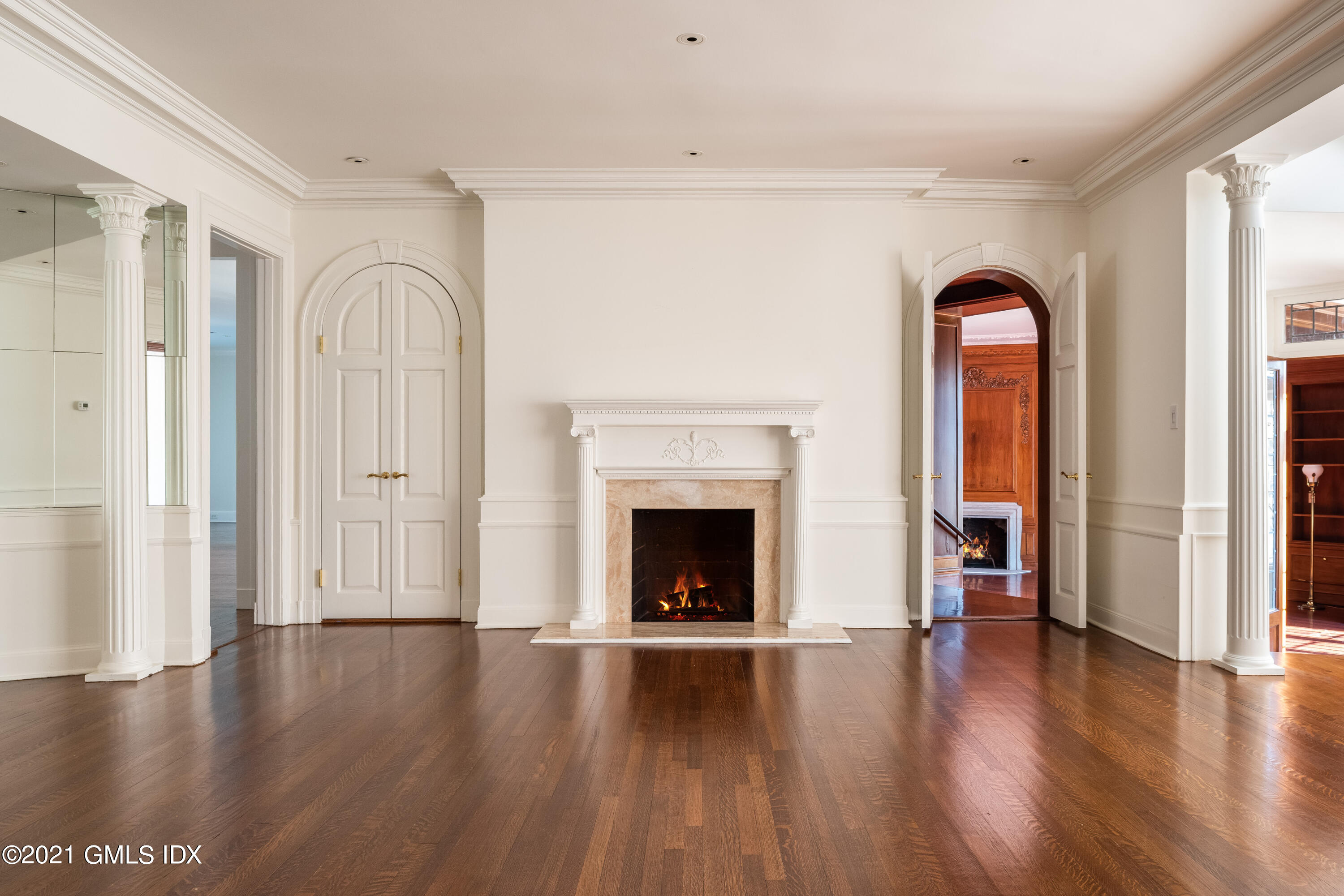 25 Doubling Road Greenwich, CT 06830 - Photo 7 of 30 a view of an empty room with window and fire place